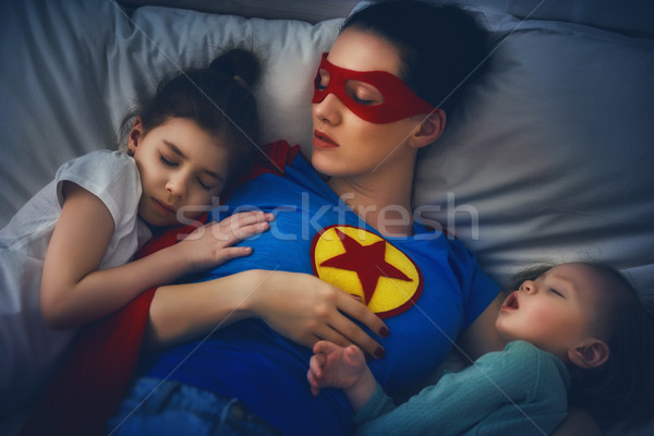 Védelem anya szuperhős imádnivaló kicsi gyerekek Stock fotó © choreograph