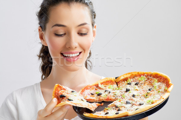 Délicieux pizza fille manger femme sourire [[stock_photo]] © choreograph