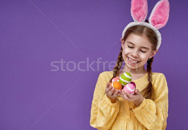 Girl with painted egg Stock photo © choreograph