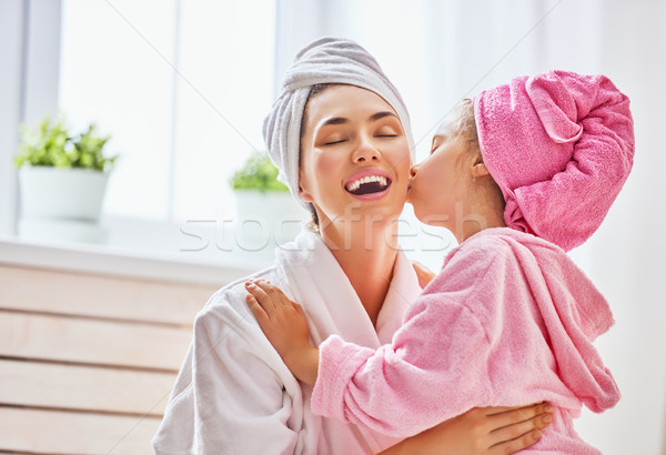 Woman and girl with towels on heads Stock photo © choreograph