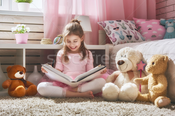 girl is reading a book Stock photo © choreograph