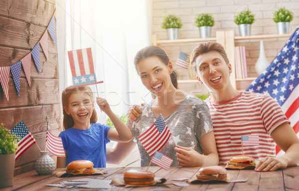 Patriotic holiday. Happy family Stock photo © choreograph