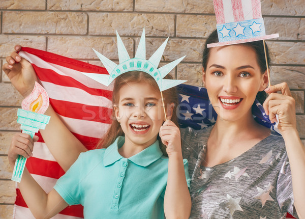 Patriotic holiday. Happy family Stock photo © choreograph