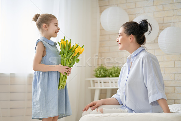 daughter congratulating mom Stock photo © choreograph