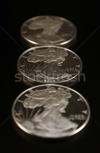 Três prata dólares americano Águia moedas Foto stock © chrisbradshaw
