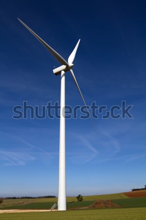 Wind turbine on blue sky Stock photo © chrisroll