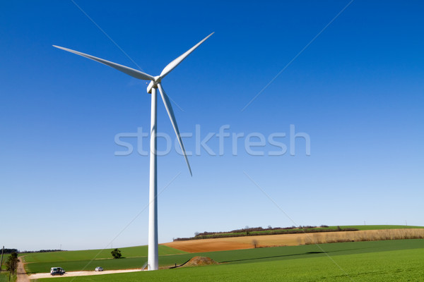 Wind turbine under clear blue sky Stock photo © chrisroll