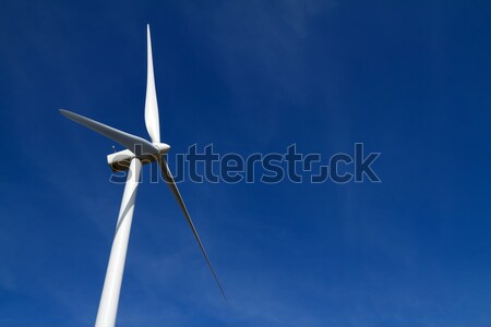 Wind turbine on blue sky Stock photo © chrisroll