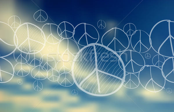 Peace symbol over blue sky blurred background Stock photo © cienpies