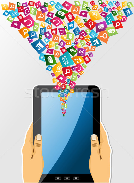 Human hands holds a tablet pc social media icons. Stock photo © cienpies