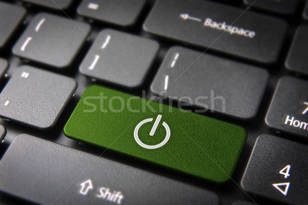 Green Power On keyboard key, technology background Stock photo © cienpies
