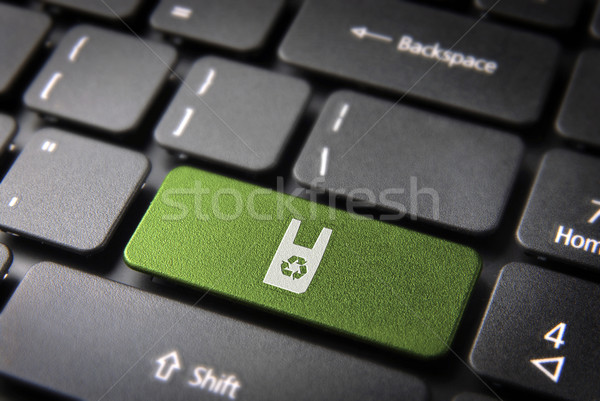 Green keyboard key with recycle plastic icon Stock photo © cienpies