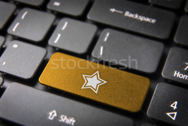 Gold Star keyboard key, Entertainment background Stock photo © cienpies