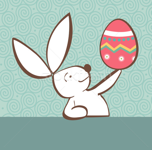 Easter bunny with painted egg Stock photo © cienpies