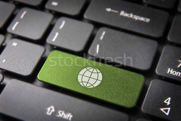 Go green globe keyboard key, ecology background Stock photo © cienpies