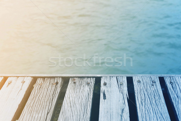 Vintage summer time wooden deck over sea Stock photo © cienpies