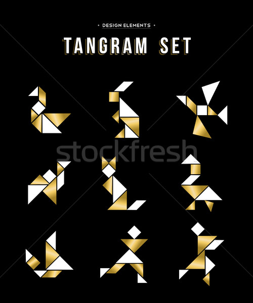 Classic tangram game icon set in gold color Stock photo © cienpies