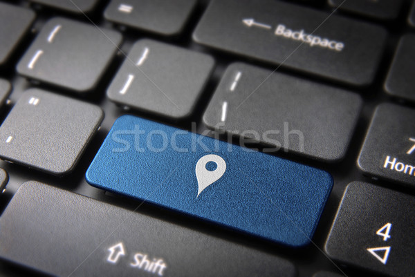 Blue geo location keyboard key, technology background Stock photo © cienpies