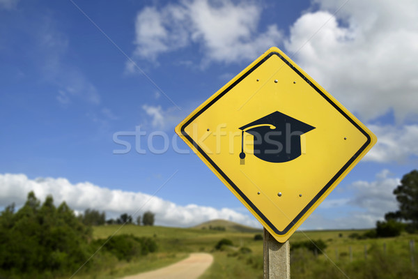 Education concept road sign with college hat icon Stock photo © cienpies