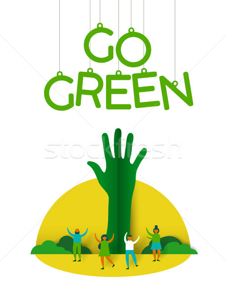 People with paper cut tree for environment help Stock photo © cienpies