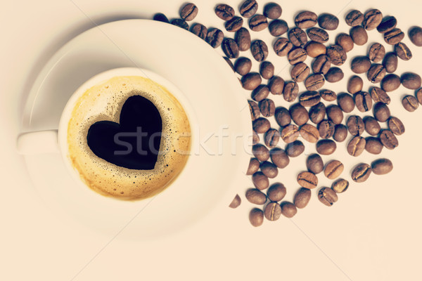 Coffee cup with love heart shape on foam Stock photo © cienpies