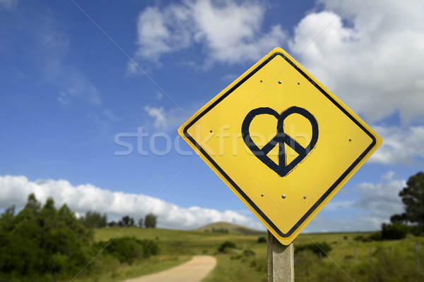 Dream of peace and love road sign icon concept Stock photo © cienpies