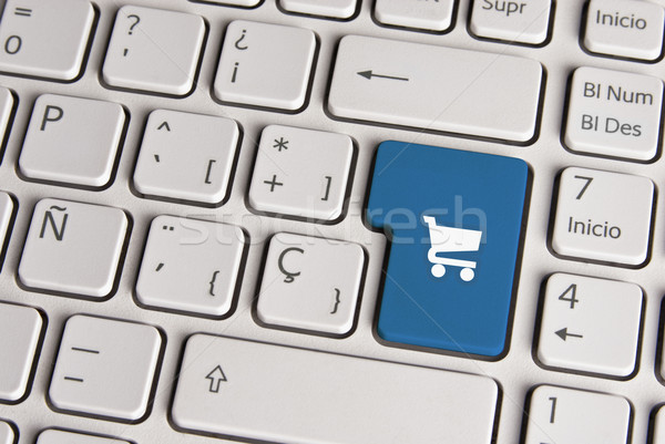 Buy concept, shopping cart keyboard key. Stock photo © cienpies