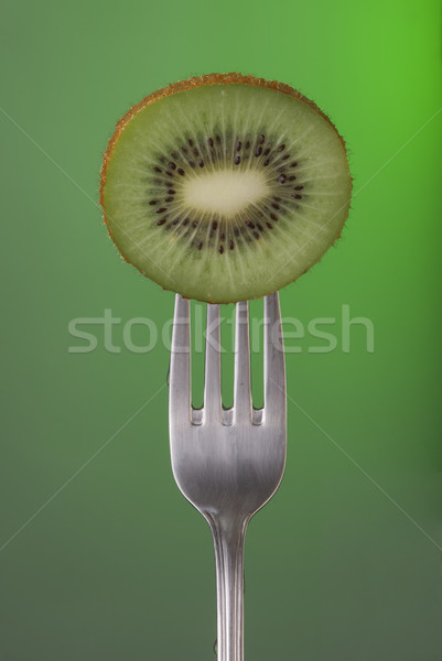 Kiwi owoców widelec zielone zdrowia plakat Zdjęcia stock © cienpies