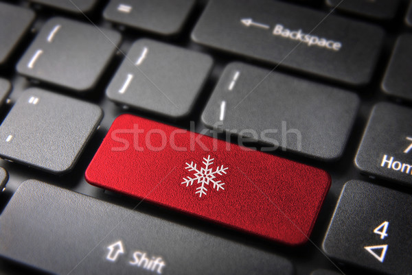 Red keyboard key with snow icon, season background Stock photo © cienpies