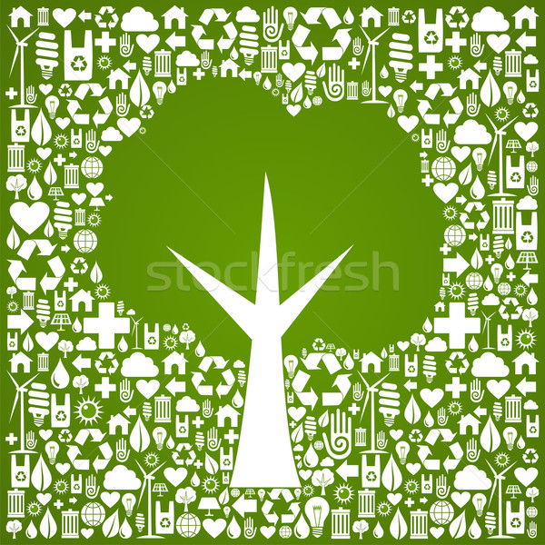 Green tree shape over eco icons background Stock photo © cienpies