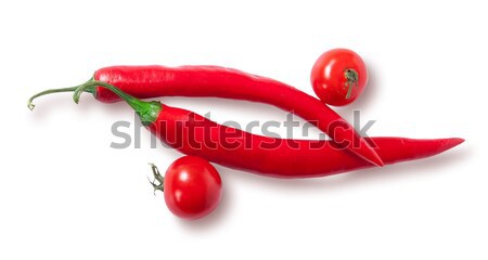 Two chili pepper and two cherry tomatoes top view Stock photo © Cipariss