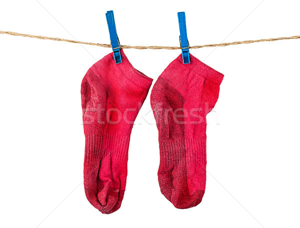Pair of washed red socks on rope Stock photo © Cipariss