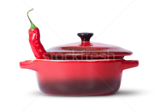 In front red chili pepper in saucepan with lid Stock photo © Cipariss