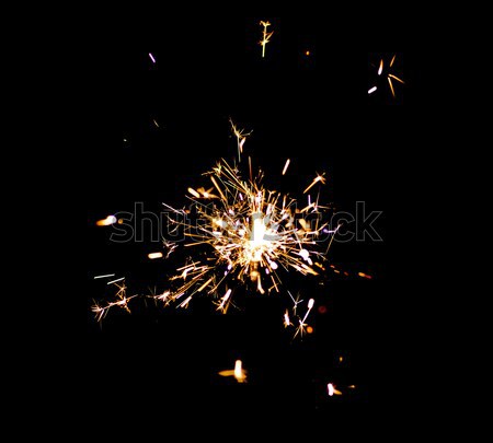 Lumineuses nouvelle année Noël sparkler noir Photo stock © Cipariss
