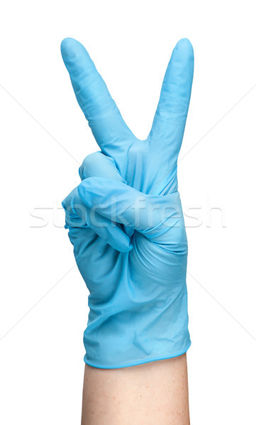 Kéz kék latex kesztyű mutat kettő Stock fotó © Cipariss