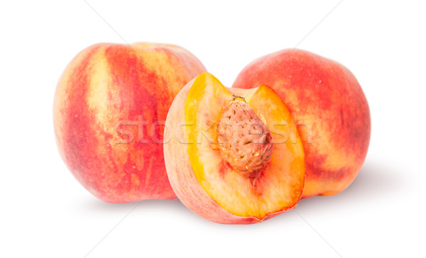 Two whole and half of peach Stock photo © Cipariss