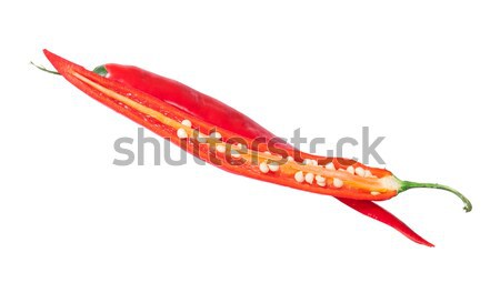 Two intersecting halves of red chili peppers Stock photo © Cipariss