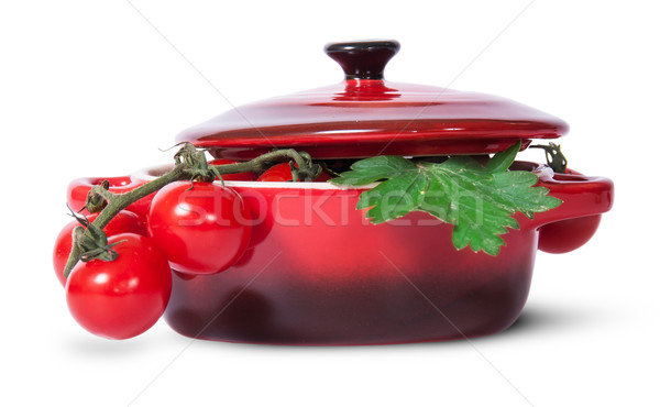 Cherry tomatoes on stem and parsley in saucepan Stock photo © Cipariss