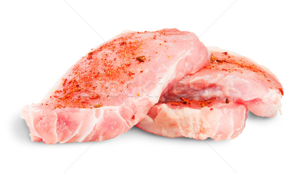 Heap Of Three Pieces Of Raw Pork With Spices Stock photo © Cipariss