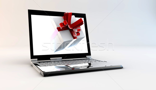 Laptop with gift Stock photo © cla78