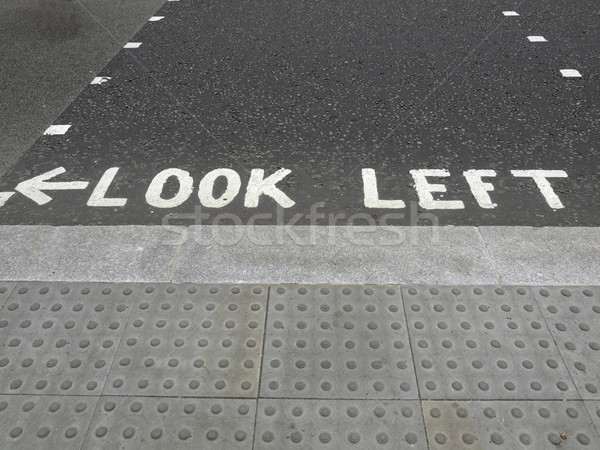 Look Left sign Stock photo © claudiodivizia