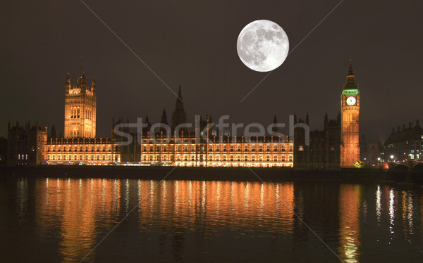 Evler parlamento gece görmek dolunay westminster Stok fotoğraf © claudiodivizia