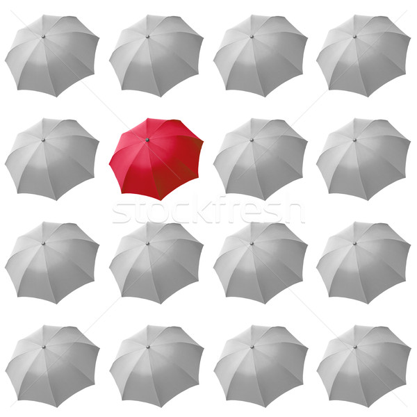 Red umbrella among white Stock photo © claudiodivizia