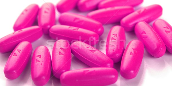 Pílulas pormenor alcance médico farmacêutico hospital Foto stock © claudiodivizia