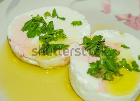 Tomino cheese with rucola and olive oil Stock photo © claudiodivizia