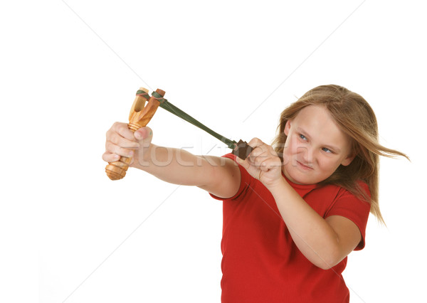 Naughty little girl with a slingshot on white Stock photo © clearviewstock