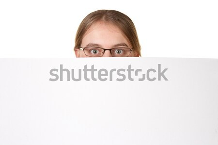 business woman peering over white sign Stock photo © clearviewstock