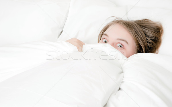 young woman peeking out Stock photo © clearviewstock