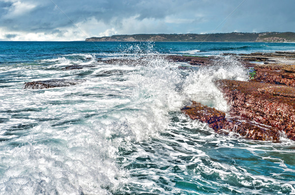 waves on rocks at the coast Stock photo © clearviewstock