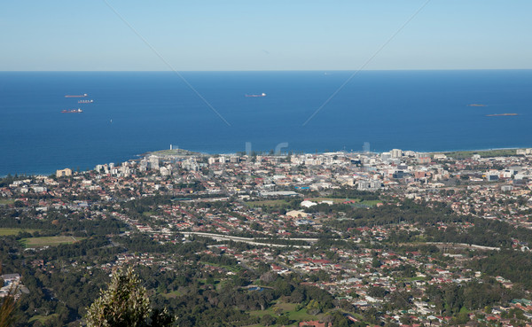 Stad naar beneden te kijken bomen oceaan Stockfoto © clearviewstock